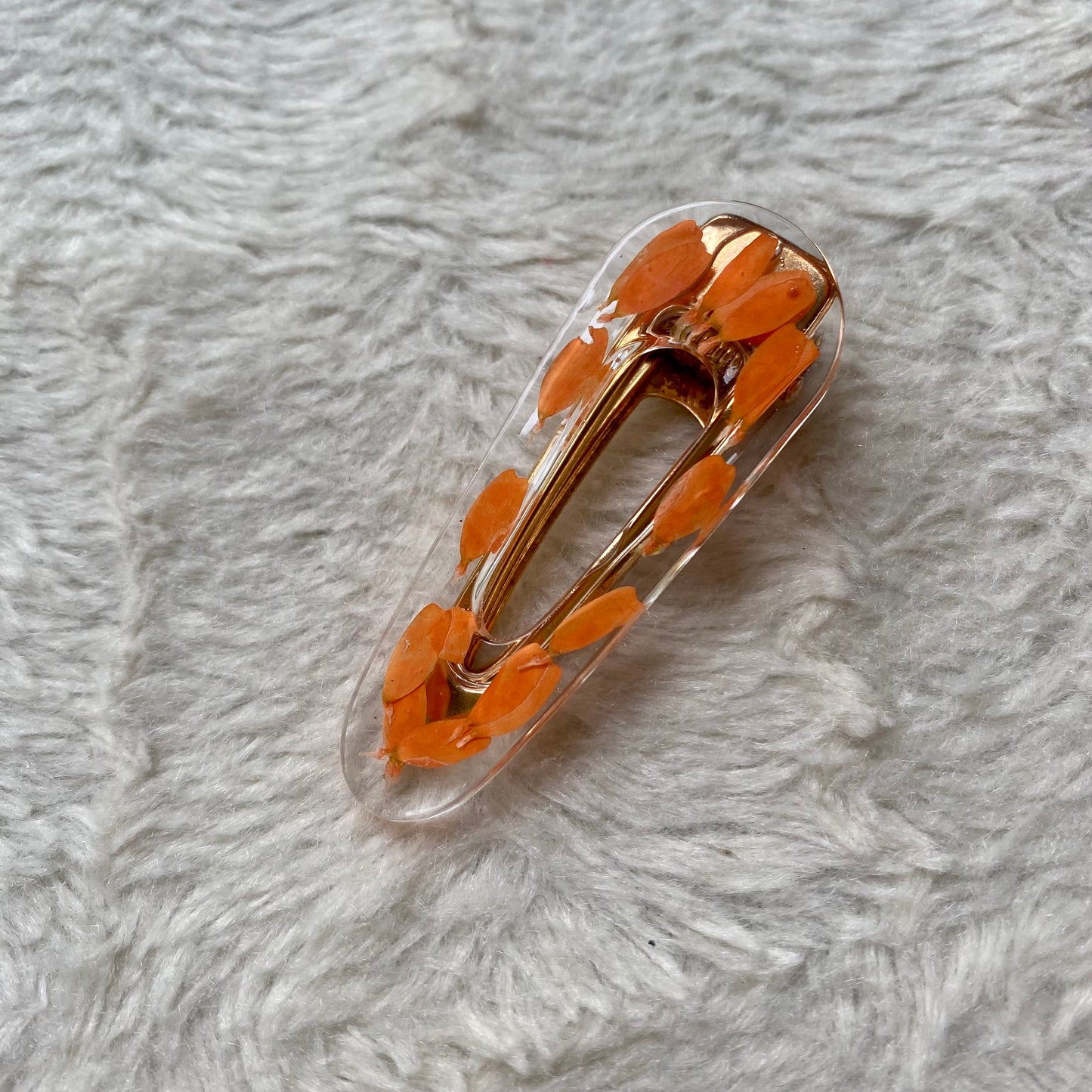 Barrette Marguerite orange